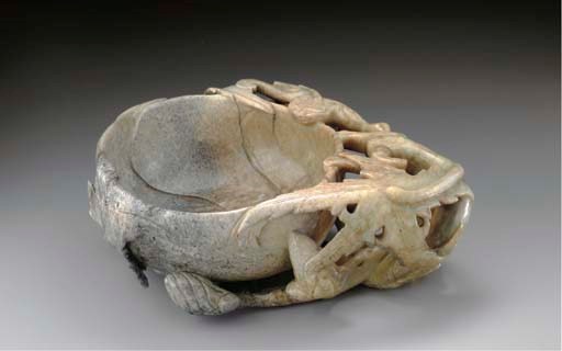 A CHICKEN-BONE JADE HIBISCUS-FORM BRUSHWASHER