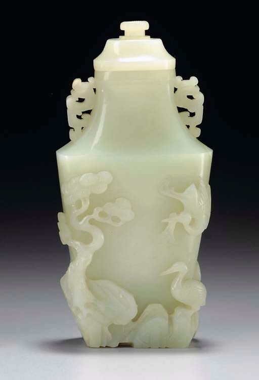 A SMALL WHITE JADE VASE AND A COVER