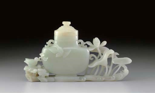 A WHITE JADE VASE AND LOTUS GROUP