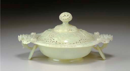 A PALE GREENISH-WHITE JADE BOWL AND COVER