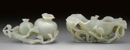 A PALE GREENISH-WHITE JADE LOTUS LEAF POURING VESSEL