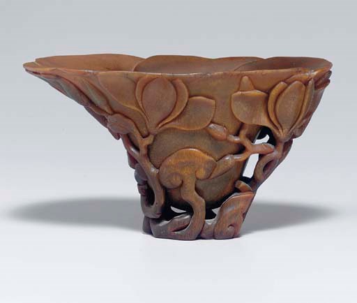 **A BOTANICAL MOTIF RHINOCEROS HORN LIBATION CUP