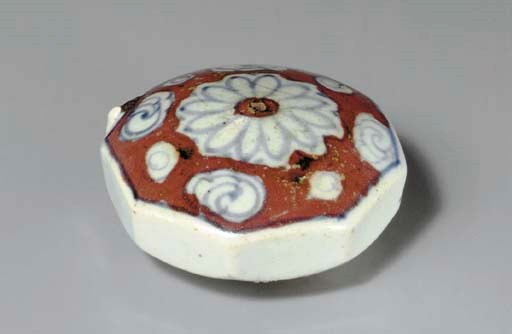 An Octagonal Copper and Blue-Decorated Water Dropper