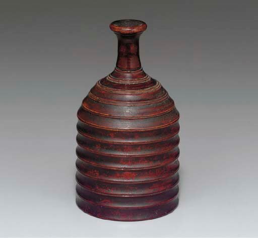 A Beveled Wood Bottle