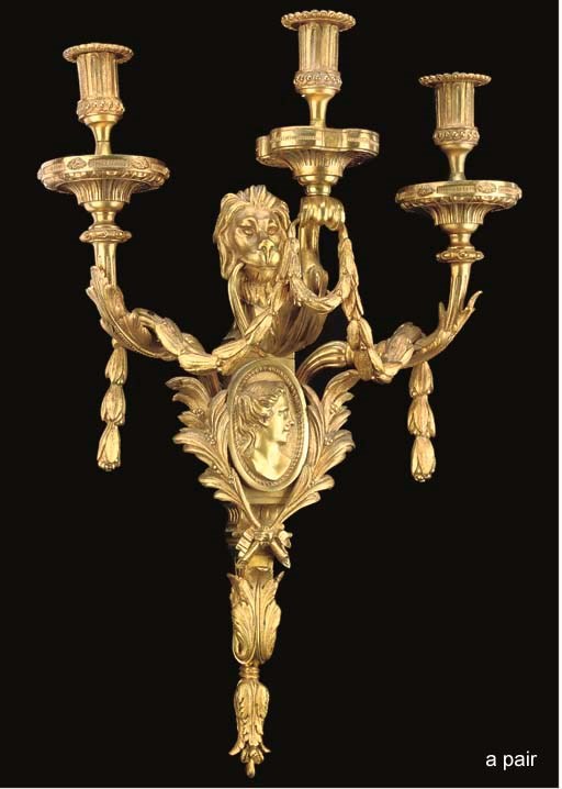 A PAIR OF GILT BRONZE THREE-LIGHT WALL APPLIQUES