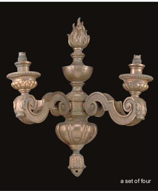 A SET OF FOUR LARGE GILT BRASS TWIN-LIGHT WALL APPLIQUES