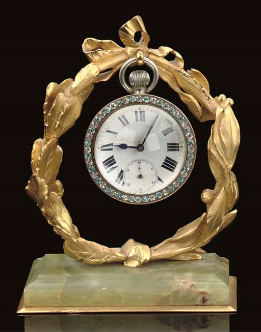 A FRENCH GLASS SPHERE TIMEPIECE