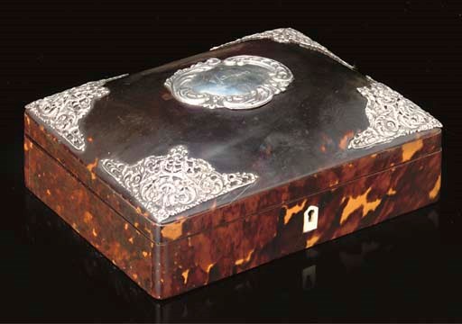 AN EDWARDIAN SILVER-MOUNTED TORTOISESHELL CASKET