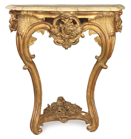 A LOUIS XV CARVED GILTWOOD CONSOLE TABLE