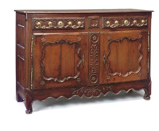 A LOUIS XV PROVINCIAL OAK BUFFET