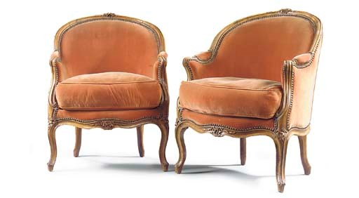 A PAIR OF LATE LOUIS XV WALNUT BERGERES