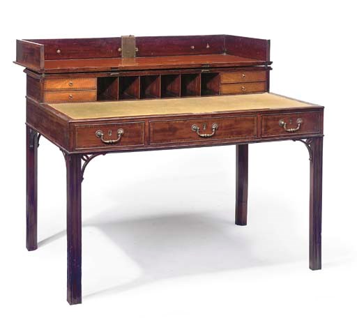 A GEORGE III MAHOGANY DESK
