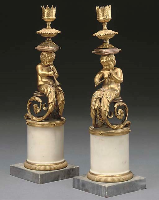 A PAIR OF GILT-BRONZE AND MARBLE CANDLESTICKS