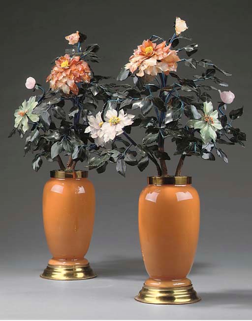 A PAIR OF COLOURED STONE AND PORCELAIN ORNAMENTAL VASES