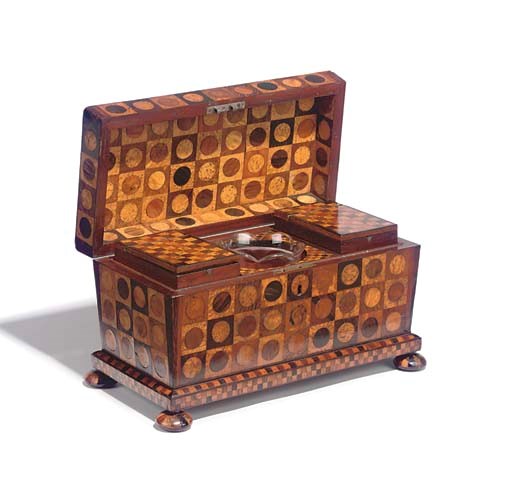 AN EARLY VICTORIAN PARQUETRY TEA CADDY