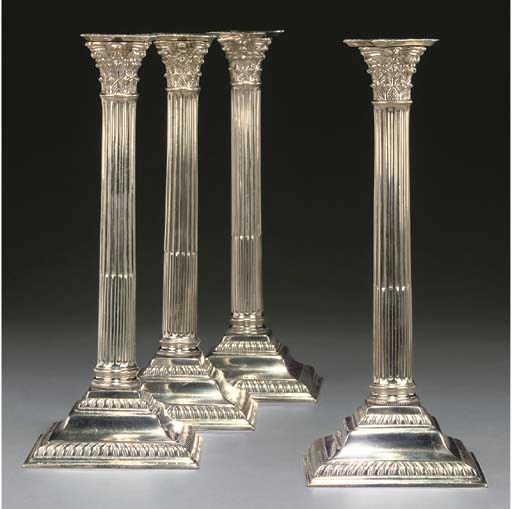 FOUR GEORGE III PAKTONG CANDLESTICKS
