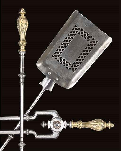A SET OF THREE POLISHED STEEL AND BRASS FIRE IRONS