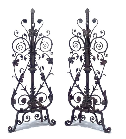 A PAIR OF WROUGHT IRON ANDIRONS