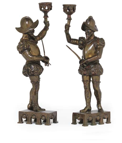 A PAIR OF CONTINENTAL BRONZE CANDLESTICKS