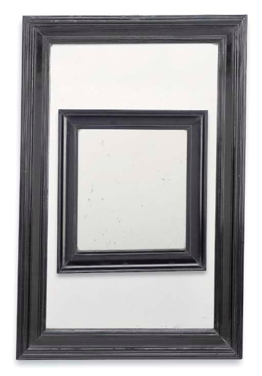 TWO GERMAN EBONISED MIRRORS