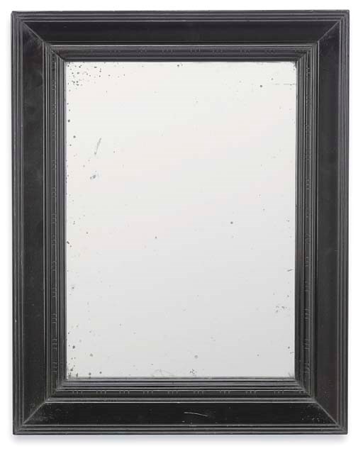 A GERMAN EBONISED STRUT MIRROR