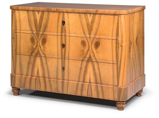 A SOUTH GERMAN FIGURED WALNUT COMMODE