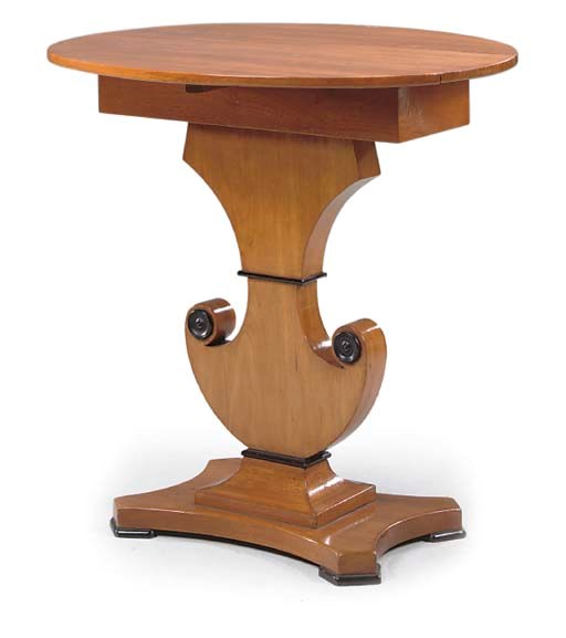 A BIEDERMEIER STYLE CHERRYWOOD DROP LEAF TABLE
