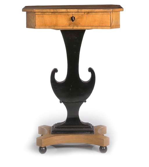 A BIEDERMEIER WALNUT CHERRYWOOD EBONISED AND INLAID WORK TABLE