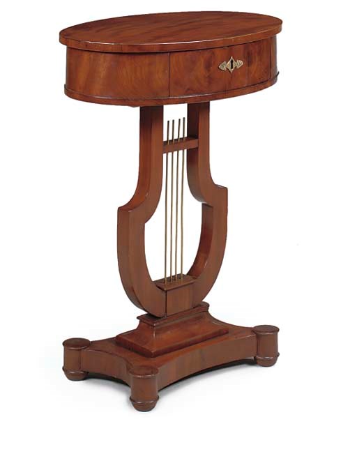 A SWEDISH MAHOGANY OVAL WORK TABLE
