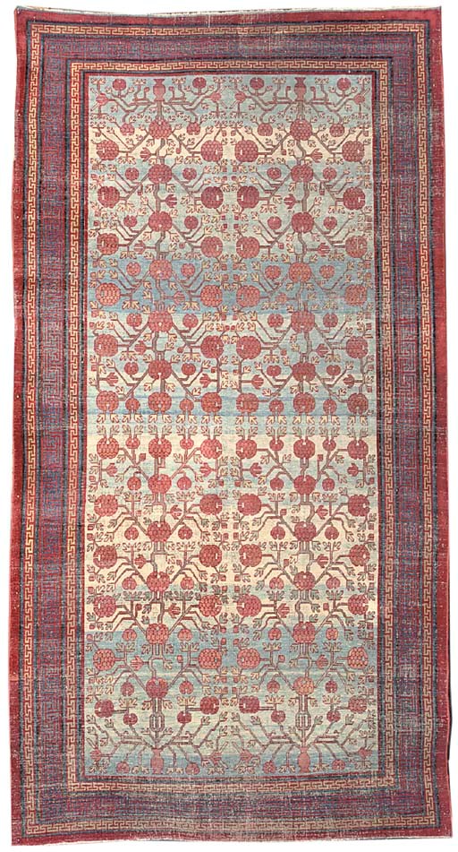 A SILK YARKAND CARPET