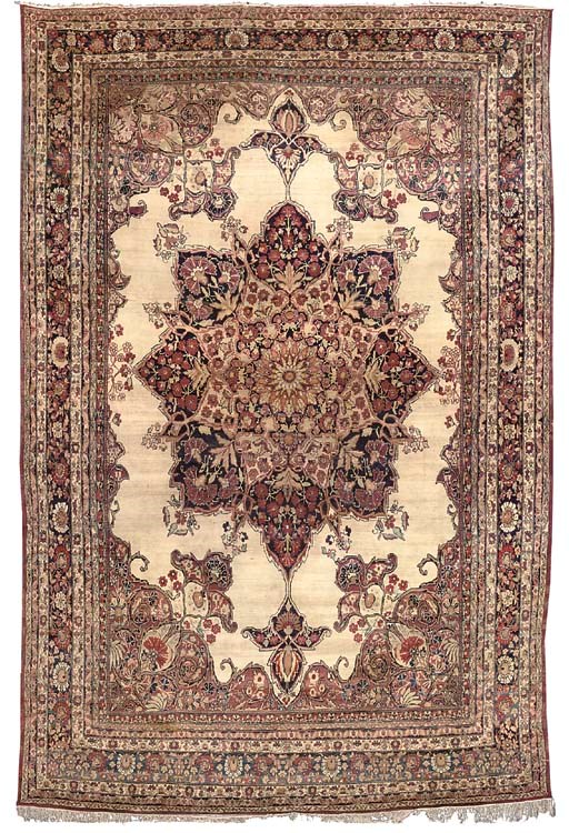 A KIRMAN CARPET