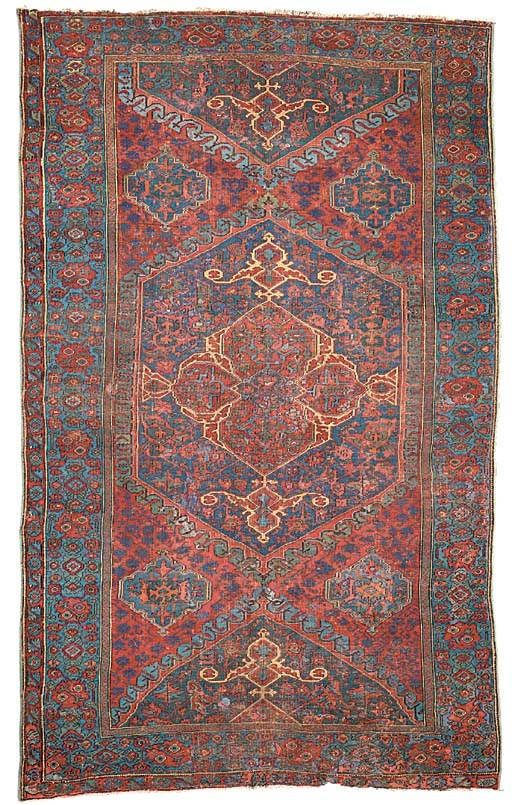 AN USHAK MEDALLION CARPET