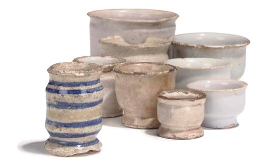 Nine 17th-Century English Delft ointment pots,