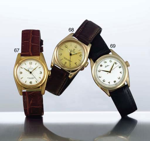 ROLEX.  A STAINLESS STEEL AND GOLD AUTOMATIC WRISTWATCH WITH CENTER SECONDS