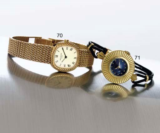 PATEK PHILIPPE. A RARE AND UNUSUAL LADY'S 18K GOLD WRISTWATCH WITH ENAMEL DIAL