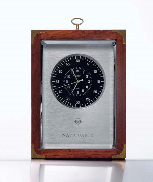 PATEK PHILIPPE. A STAINLESS STEEL ELECTRONIC MARINE CHRONOMETER WITH SWEEP SECONDS AND WOOD AND BRASS BOX
