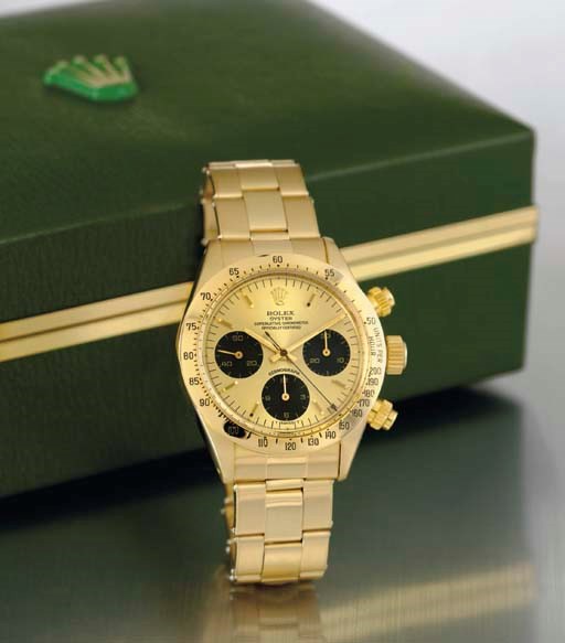 ROLEX. A RARE 14K GOLD CHRONOGRAPH WRISTWATCH WITH BRACELET