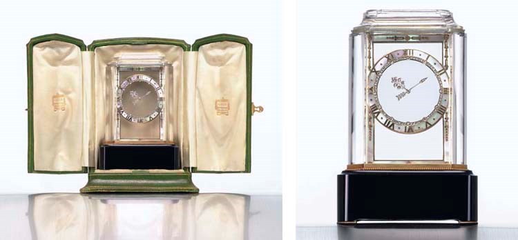 CARTIER. AN EXQUISITE AND RARE ART DECO ROCK CRYSTAL, ONYX, MOTHER-OF-PEARL AND DIAMOND-SET "MODEL A" MYSTERY CLOCK WITH TRAVELING CASE
