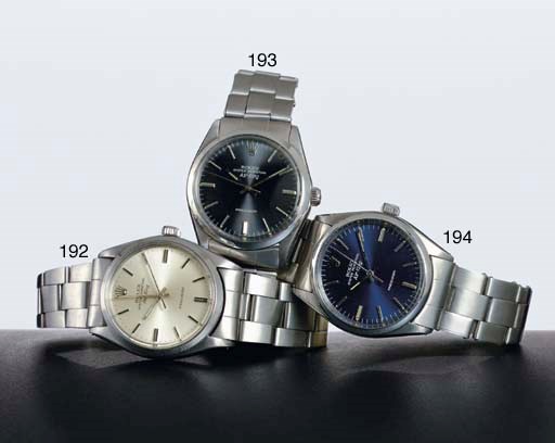 ROLEX. A STAINLESS STEEL AUTOMATIC WRISTWATCH WITH CENTER SECONDS AND BRACELET