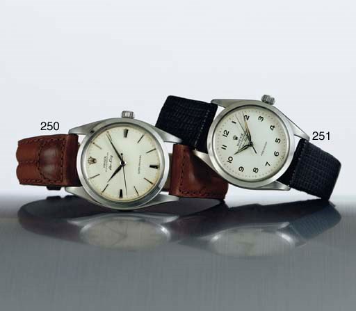 ROLEX. A STAINLESS STEEL AUTOMATIC WRISTWATCH WITH CENTER SECONDS