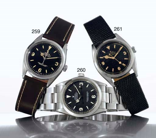 ROLEX. A STAINLESS STEEL AUTOMATIC WRISTWATCH WITH CENTER SECONDS AND BRACELET