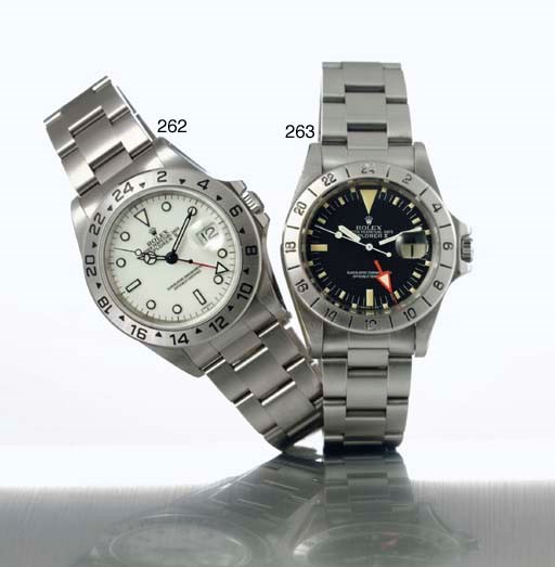 ROLEX. A STAINLESS STEEL AUTOMATIC WRISTWATCH WITH CENTER SECONDS, 24 HOURS, DATE AND BRACELET