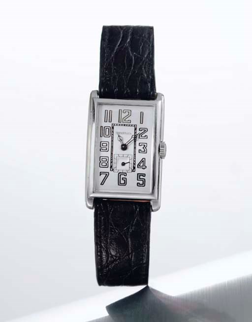 LONGINES. A WHITE GOLD RECTANGULAR WRISTWATCH