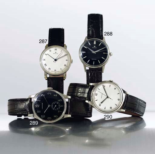 LONGINES.  A LARGE STAINLESS STEEL WRISTWATCH WITH BLACK DIAL