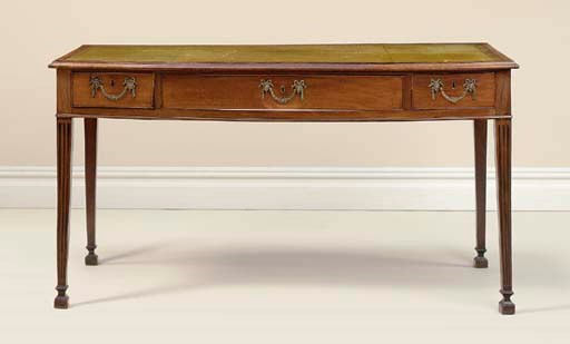 A GEORGE III MAHOGANY WRITING-TABLE