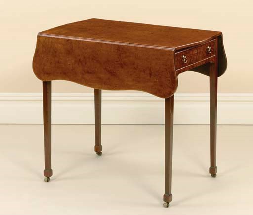 A GEORGE III 'CROCODILE' MAHOGANY PEMBROKE TABLE
