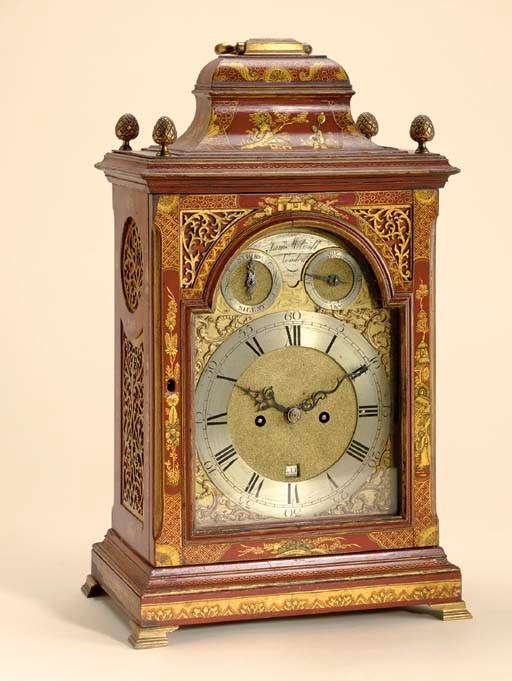 A GEORGE III SCARLET AND GILT-JAPANNED MAHOGANY STRIKING TABLE CLOCK