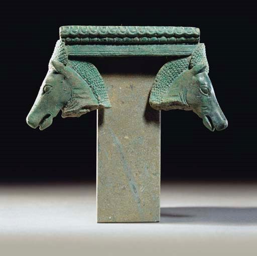 A CORINTHIAN BRONZE ATTACHMENT WITH HORSE HEADS
