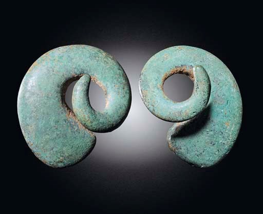 A PAIR OF ARCHAIC BRONZE VOTIVE HORNS