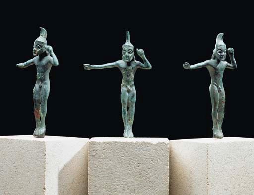 THREE LACONIAN BRONZE HELMETED WARRIORS